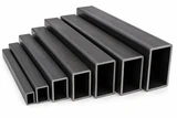 Carbon steel rectangular tubing in multiple sizes with open ends showing varying widths, heights and wall thicknesses.