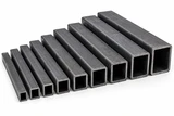 Carbon steel square tubing in multiple sizes with open ends showing varying outside dimensions and wall thicknesses.