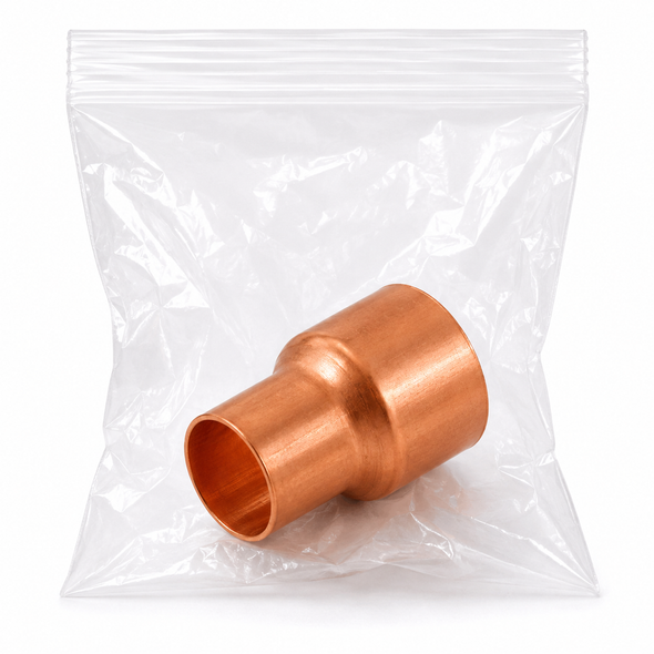 Domestic cleaned and bagged wrot copper reducing coupling for connecting two different copper tube sizes in clean and controlled piping systems.