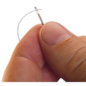 PTFE Sub-Lite© Wall Tubing in hand