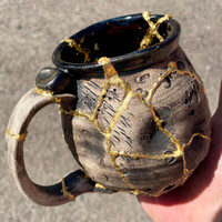 DAY 1, March 18th, 2024: Smashed Mug, Glued Back Together and Gilded with 24 Karat Gold, Non-Functional Sculpture