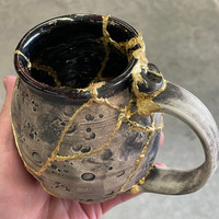 DAY 3, March 20th, 2024: Smashed Mug, Glued Back Together and Gilded with 24 Karat Gold, Non-Functional Sculpture