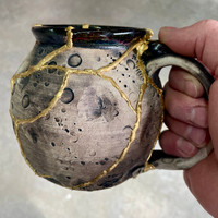 DAY 6, March 23rd, 2024: Smashed Mug, Glued Back Together and Gilded with 24 Karat Gold, Non-Functional Sculpture