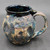 One  Multicolored “Moon Mug” w/24 karat gold accent, Holds roughly 18-20 ounces (SK7717)