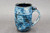 Blue Asteroid Mug, Multicolored Interior, roughly 15-16 oz. size, (SK000479)