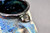 Blue Moon Mug w/24 Karat Gold Thumb Spot and Galaxy Interior, roughly 16-18oz. size, (SK0541)