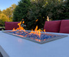 1/2" Neptune Blue Reflective fire glass in a fire pit