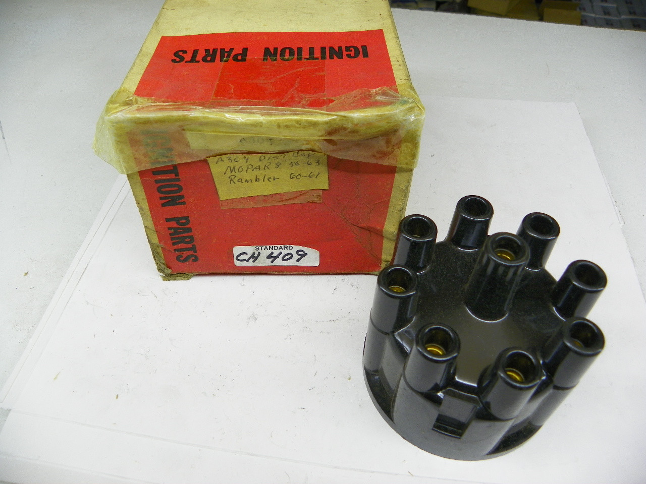 Standard CH409 Distributor Cap for 1956-1963 Mopar Rambler V8 ignition restoration. - Image 1
