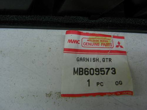 Mitsubishi MB609573 Garnish QTR for vintage car restoration. - Image 2