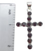 Faceted Garnet Sterling Silver Cross Pendant. A round-shaped faceted garnet gemstone is set in genuine .925 sterling silver.