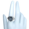 Black Onyx Sterling Silver Ring. An oval-shaped black onyx gemstone is set in genuine .925 sterling silver.