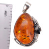Amber Sterling Silver Handmade Fly Design Pendant. Teardrop-shaped cognac and cherry genuine Baltic amber stones are set in .925 sterling silver. Handcrafted fly design.