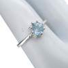 Faceted blue topaz sterling silver ring.