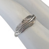 .925 silver feather ring on finger