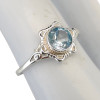 Faceted Blue Topaz Scrollwork Sterling Silver Ring