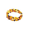Multi-color amber memory wire bracelet. Round, olive and free-shaped amber beads are set on a wire. Genuine Baltic amber.