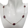 Composite Ruby Stones Sterling Silver Necklace. Oval-shaped stones are set in .925 sterling silver. 24'' long.