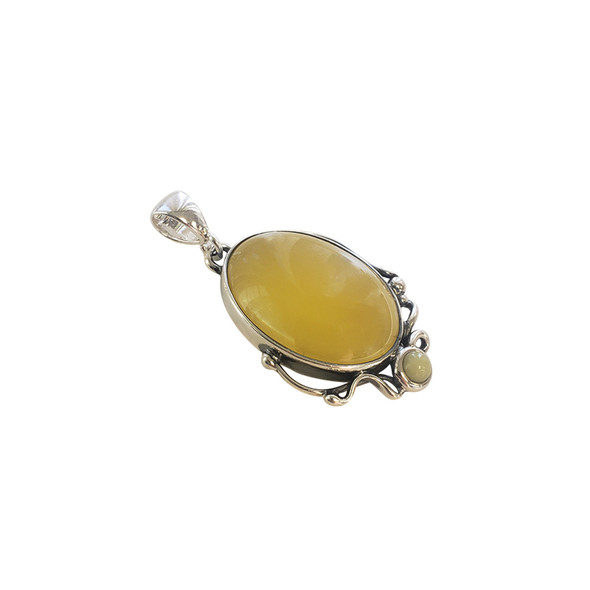 Butterscotch Amber Sterling Silver Pendant .