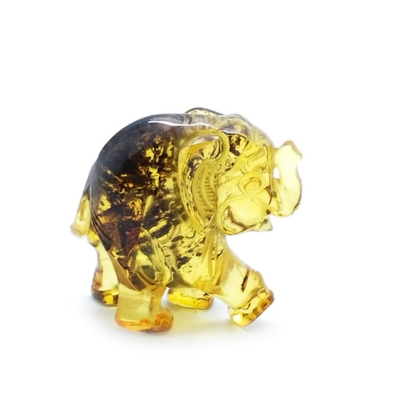 Cognac Amber Carved Elephant ....