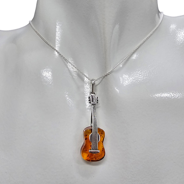 Cognac Amber Sterling Silver Guitar Pendant