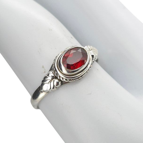 Faceted garnet sterling silver ring