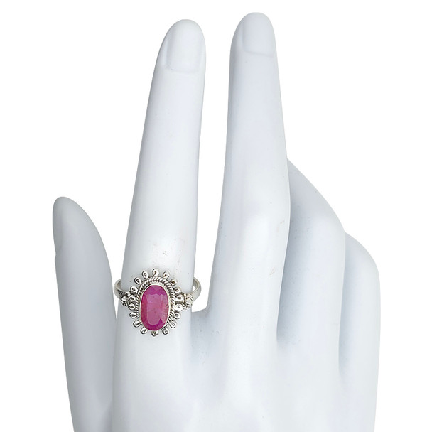 Amethyst Sterling Silver Ring. An oval-shaped amethyst gemstone is set in .925 sterling silver.