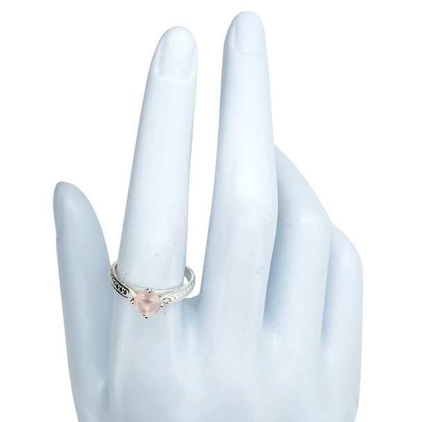 Faceted rose quartz sterling silver ring.