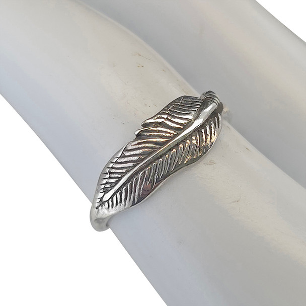 .925 silver feather ring on finger