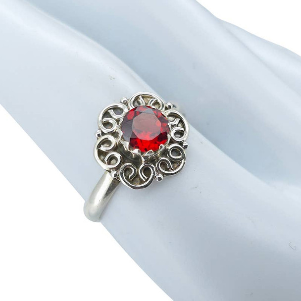 Faceted Garnet Flower Style Silver Ring