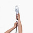Womanizer Wave hand held being attached to shower hose