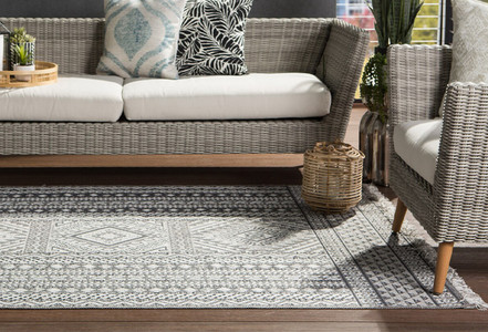 Charcoal Gray Striped Lumbar Pillow on Wood and Wicker Accent Chair -  Transitional - Living Room