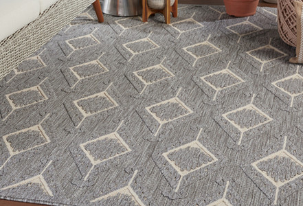 Prints and Patterns That Pair Well with Geometric Area Rugs