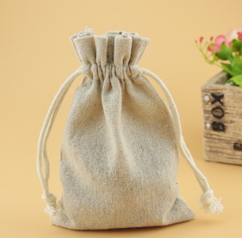 Extra Small Natural Cotton Drawstring Bags from stock in packs 10 available  next working day.