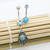 Pack of Two Belly Rings with Hamsa Hand and Cubic Zirconia Design 14ga