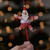 Buy Festive Holly Santa Jumping Jack From The Crafty Giraffe, the home of unique and affordable gifts for loved ones...