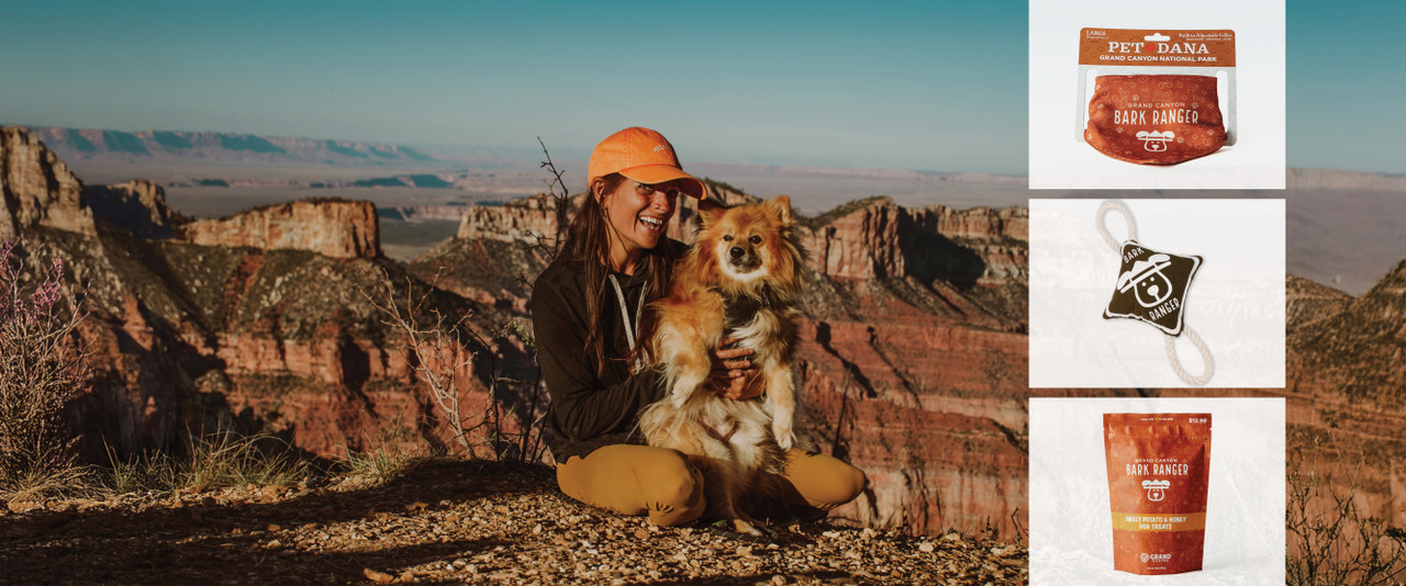 Woman in hat with dog at The Grand Canyon.