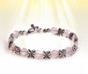 The "Sacred Gift" Flower Bracelet - Jasmine flower motif represents you receiving a great gift from spirit. Available in amethyst, pink quartz or green onyx.