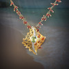 The Caribbean Treasure Stingray Necklace - Legendary powers attract abundance, wealth and ease to your life. Gold, silver, garnet, peridot.