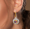 The "Messages From Spirit"  Amethyst And White Topaz Earrings.  Unique and fun to wear. Improves spiritual communication.  