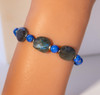 Item AA7 Live  Show. Seer's Bracelet. Blue fire faceted labradorite and denim lapis. 