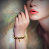 The Dragon Master Empowerment Bracelet .  For confidence, power and abundance.  Dragon's blood and 24 carat, gold plated 8 point star.
