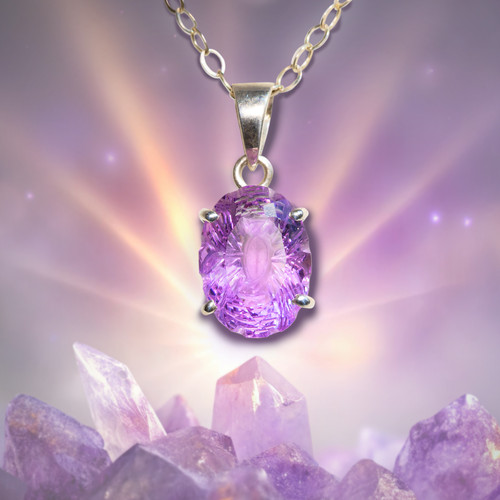 The Carved Amethyst "Spiritual Communication Super-Stone" Pendant. Enhances spiritual communication.