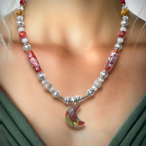 The "Dragon Within" Awakening Necklace. Includes shaman's guide to awakening and riding your dragon.  Etched dragon beads & dragon's blood .