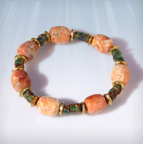 The Curse Breaker Bracelet - Blocks and removes negative energies, the evil eye and even curses.  Energy enhanced petrified coral, green mother of pearl and hematite.