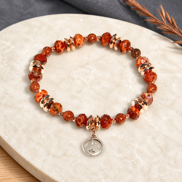 Show Item AG5- The Fire Element Bracelet.  Ignite the fire within. Fire element charm and fire agate. 