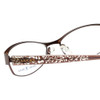 Close Up View of Lucky Brand Delilah Designer Single Vision Prescription Rx Eyeglasses in Brown Lace Trellis Ladies Cateye Full Rim Metal 52 mm