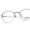 Close Up View of Joan Collins JC9553-BR Women Oval .5-Rimless Designer Reading Glasses Brown 45mm