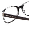 Close Up View of Porsche Designs P8250-A Designer Reading Eye Glasses with Custom Cut Powered Lenses in Black Layer Crystal Unisex Oval Full Rim Acetate 55 mm