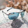 Close Up View of REVO SURGE Mens Designer Sunglasses Matte Gunmetal Black/Blue Water Mirror 62 mm