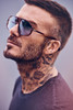Side View of David Beckham Unisex Aviator Sunglasses Havana Tortoise/Blue Photochromatic 59mm